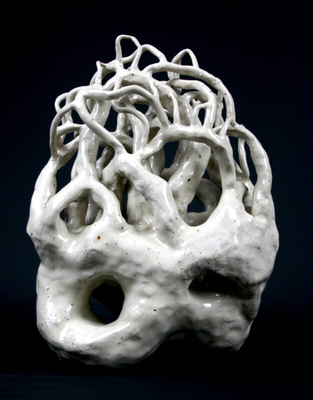 Clara Lundgrens sculpture, titled "Roots," is a captivating ceramic piece that inverts the natural growth pattern of roots.